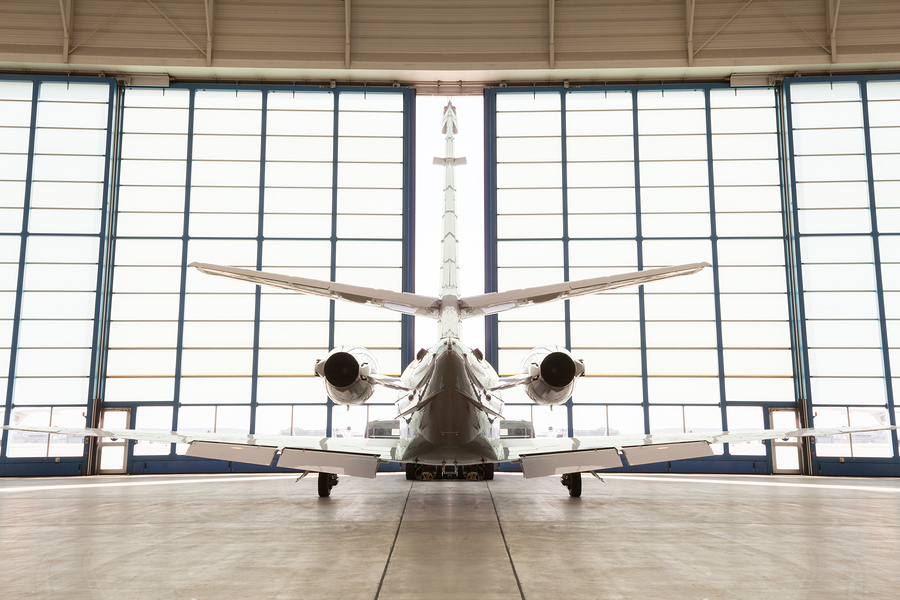 Private Corporate Jet Parked In A Hangar